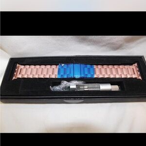 Rose gold and brown leather watch bands.